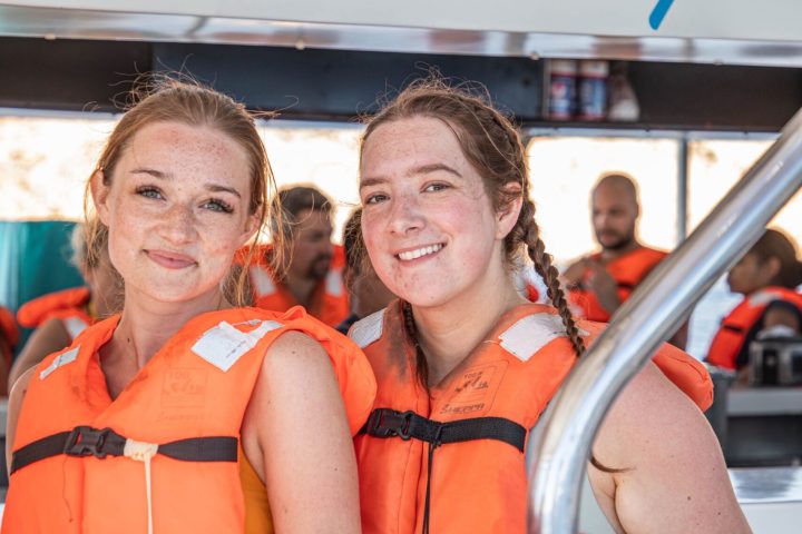 a group of people posing for the camera