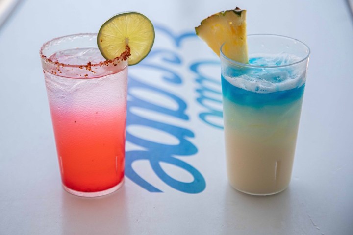 a close up of a glass of beer on a table