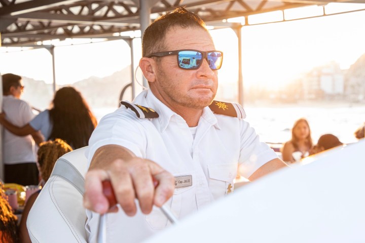 a man holding a wine glass