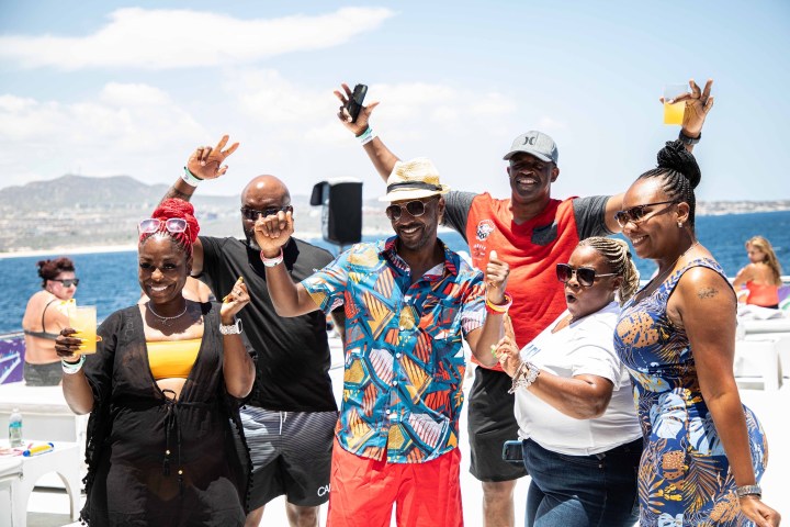 a group of people posing for the camera