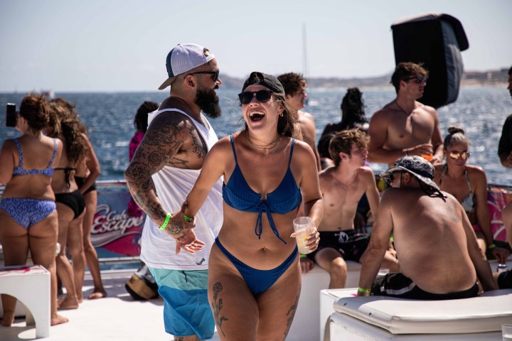 a group of people on a beach
